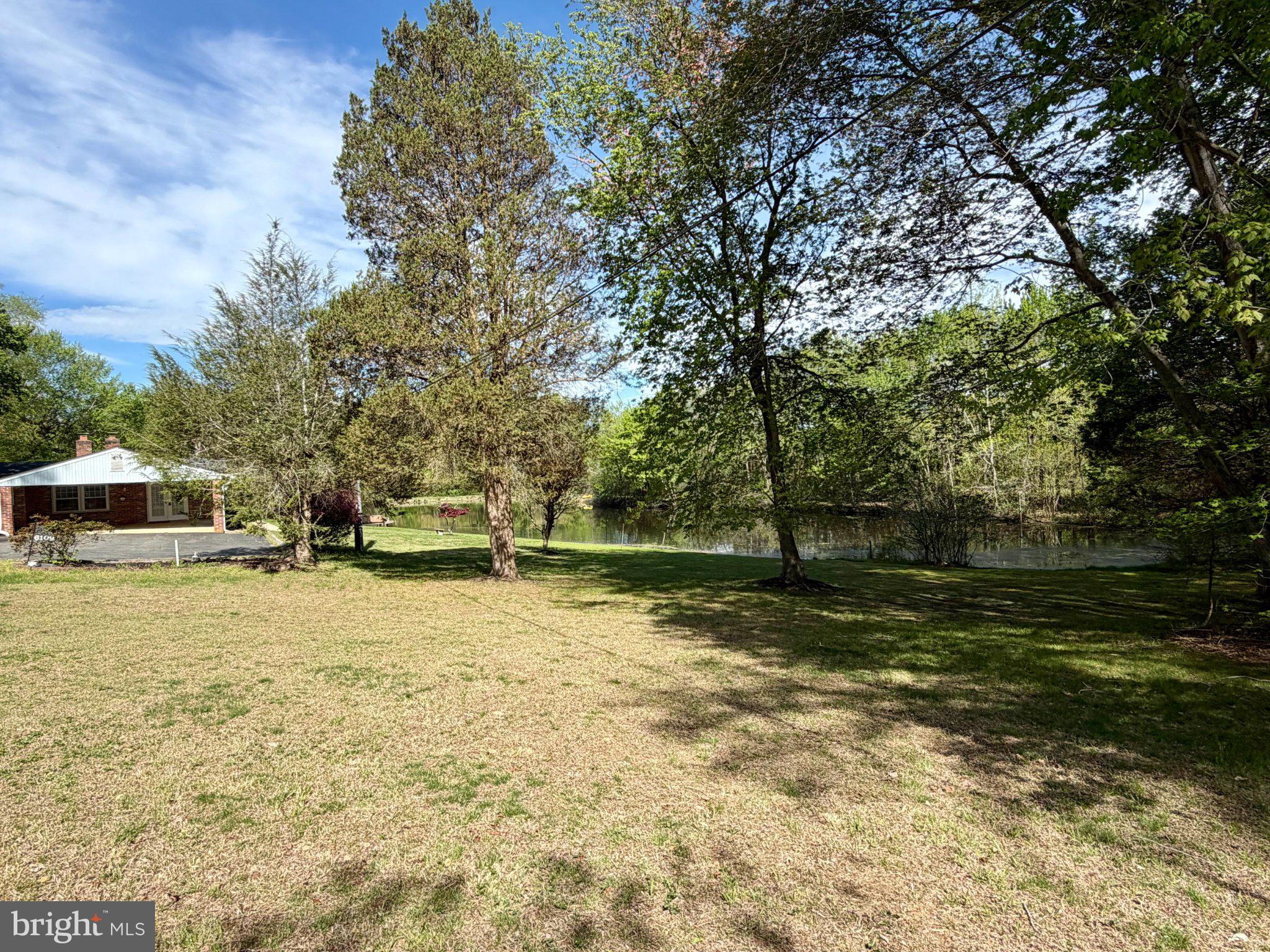 6109 Cracklingtown Road Hughesville, MD 20637 - Photo 10 of 25 a view of a house with a yard