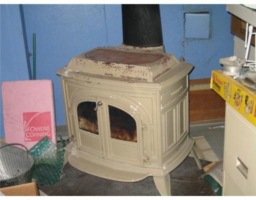 1054 Rt4 Strong Road Strong, ME 04983 - Photo 15 of 23 Other. woodstove in bsmt