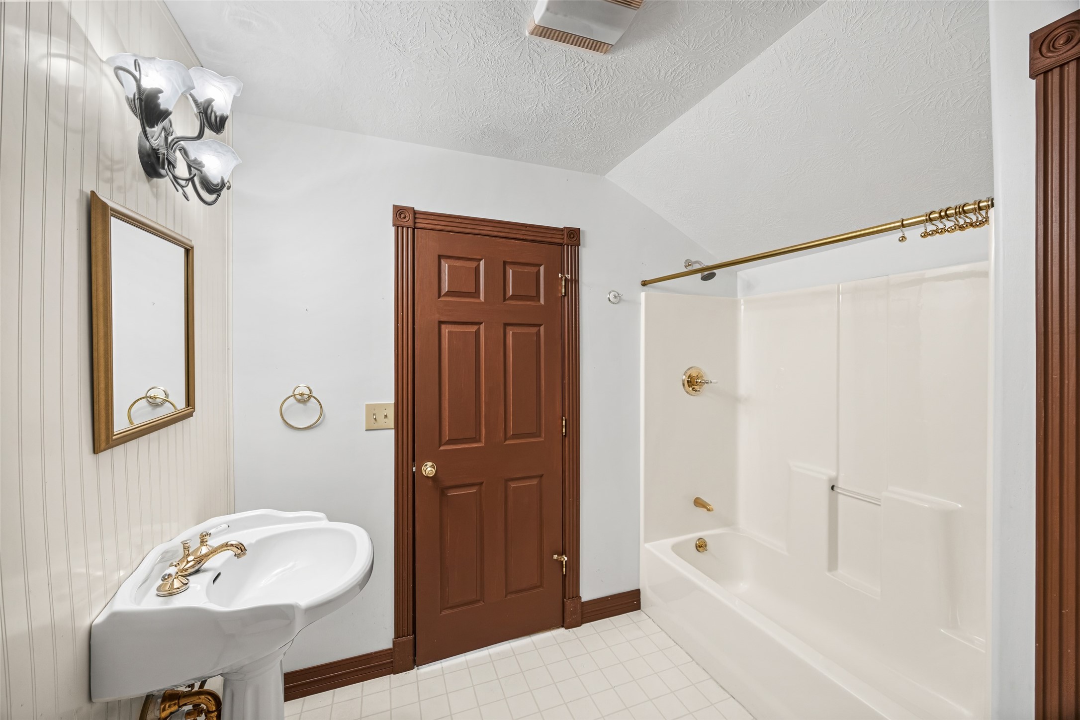 7 Northwood Country Road Huffman, TX 77336 - Photo 31 of 50 a bathroom with a sink a toilet and shower