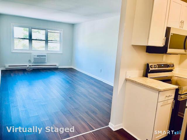 45 Monroe Street, Unit B8 Bridgeport, CT 06605 - Photo 13 of 14 an entryway with wooden floor