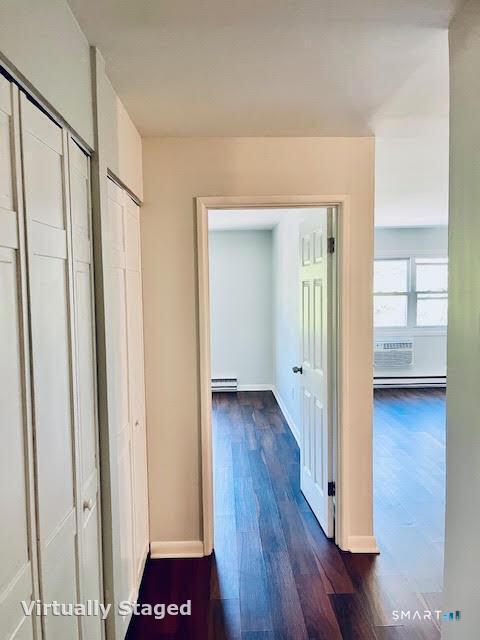 45 Monroe Street, Unit B8 Bridgeport, CT 06605 - Photo 2 of 14 a view of a hallway with wooden floor and closet