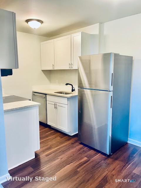 45 Monroe Street, Unit B8 Bridgeport, CT 06605 - Photo 8 of 14 a white refrigerator freezer sitting inside of a kitchen