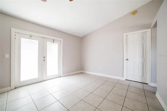 a view of an empty room and window