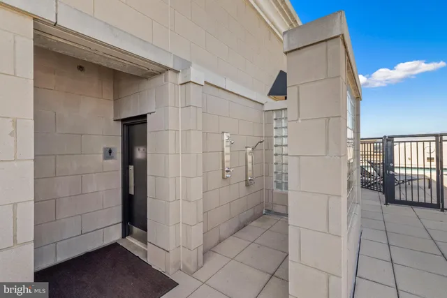 a view of a building with a street