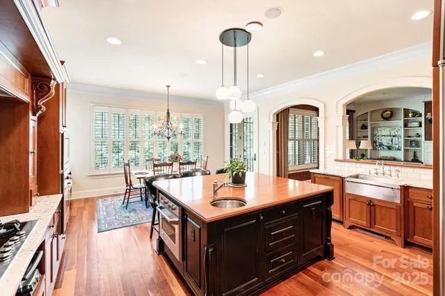 a spacious bathroom with a bathtub and sink