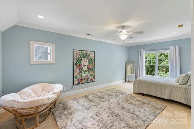 a view of a patio with a dining table and chairs with wooden floor