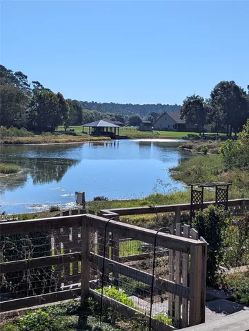 an aerial view of residential building and lake view