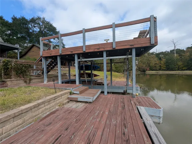 a view of a house with pool porch and wooden floor