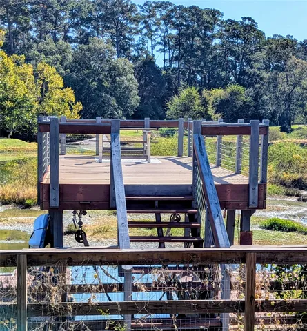 a view of a balcony with chairs