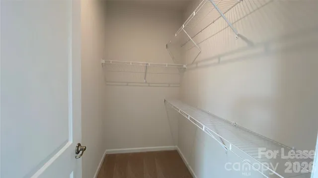 a view of a room with racks on the wall