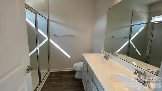 a bathroom with a sink and toilet