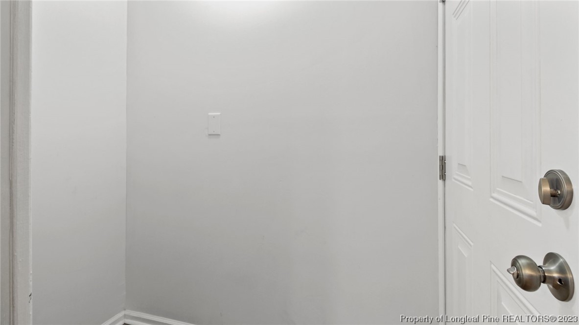 5867 Columbine Road Fayetteville, NC 28306 - Photo 13 of 26 a bathroom with a sink