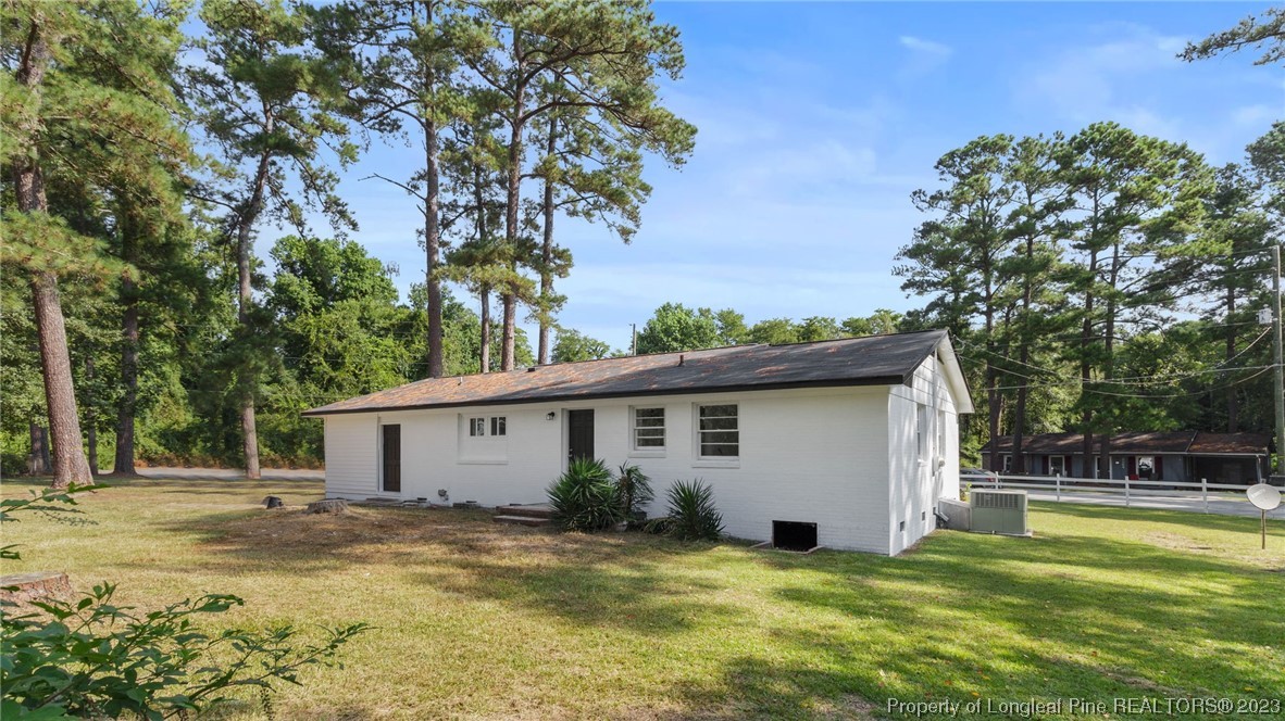 5867 Columbine Road Fayetteville, NC 28306 - Photo 25 of 26 a view of a house with a yard
