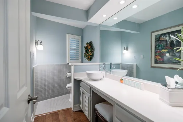 a view of a patio with table and chairs