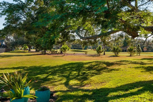 an aerial view of residential house with outdoor space