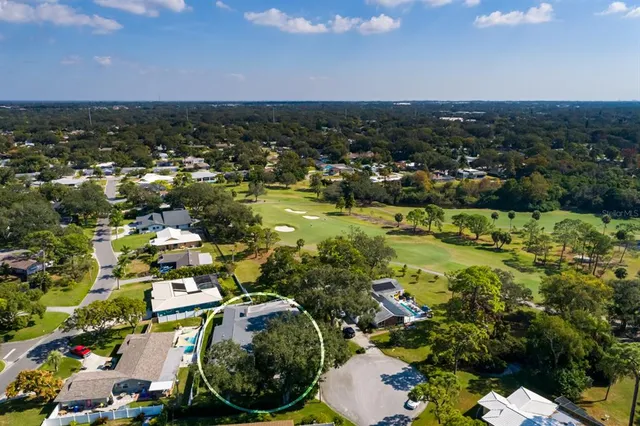 an aerial view of a building with outdoor space