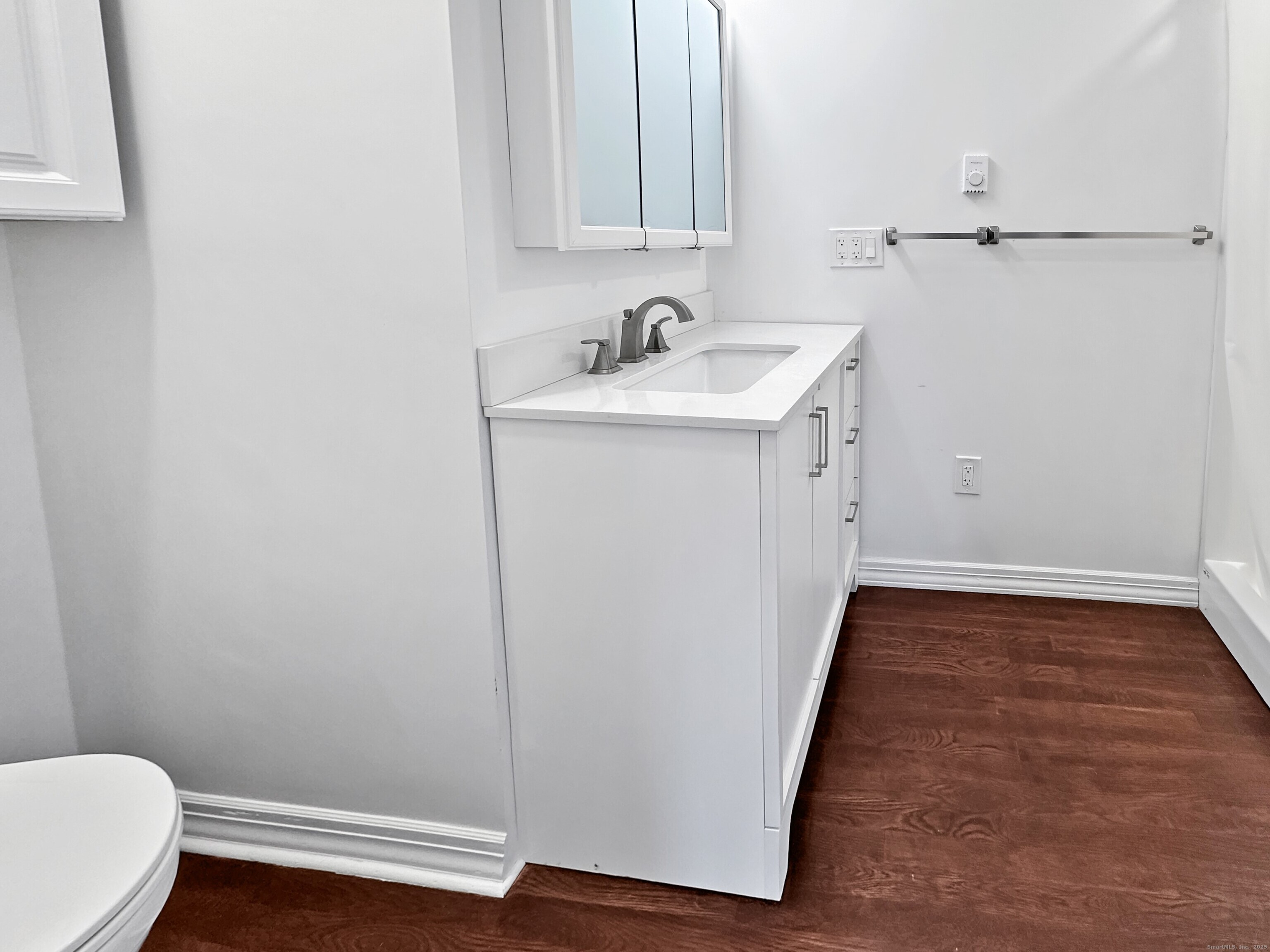 5 Chappell Street Chaplin, CT 06235 - Photo 24 of 40 a bathroom with a sink and a mirror