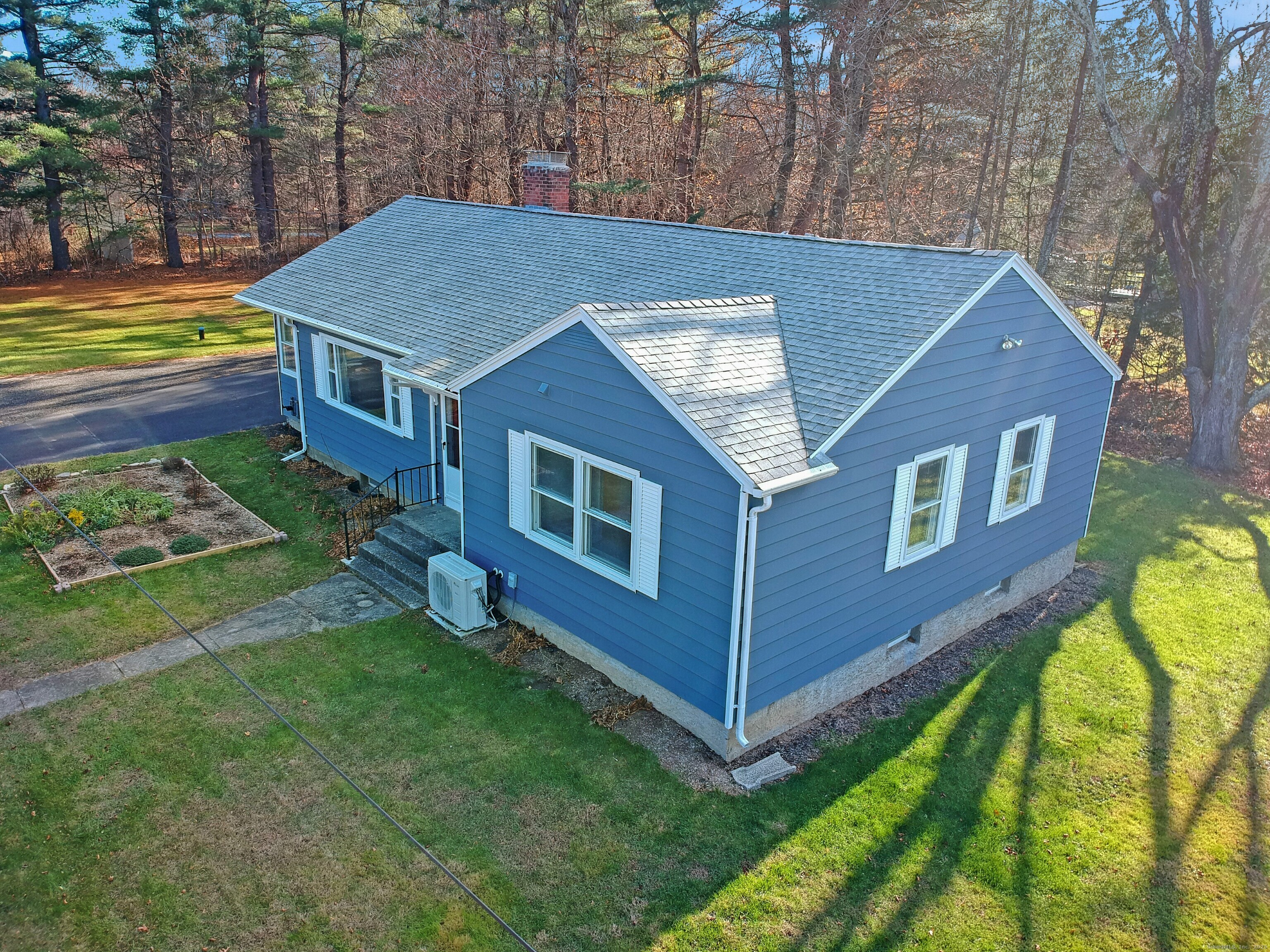 5 Chappell Street Chaplin, CT 06235 - Photo 3 of 40 a aerial view of a house with a yard