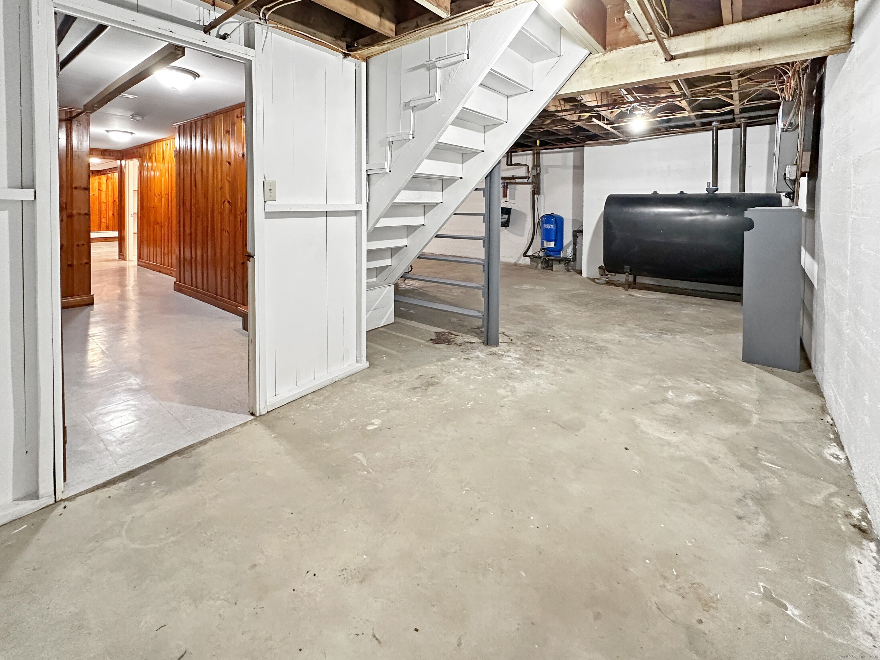 5 Chappell Street Chaplin, CT 06235 - Photo 37 of 40 a view of a livingroom with stairs and furniture