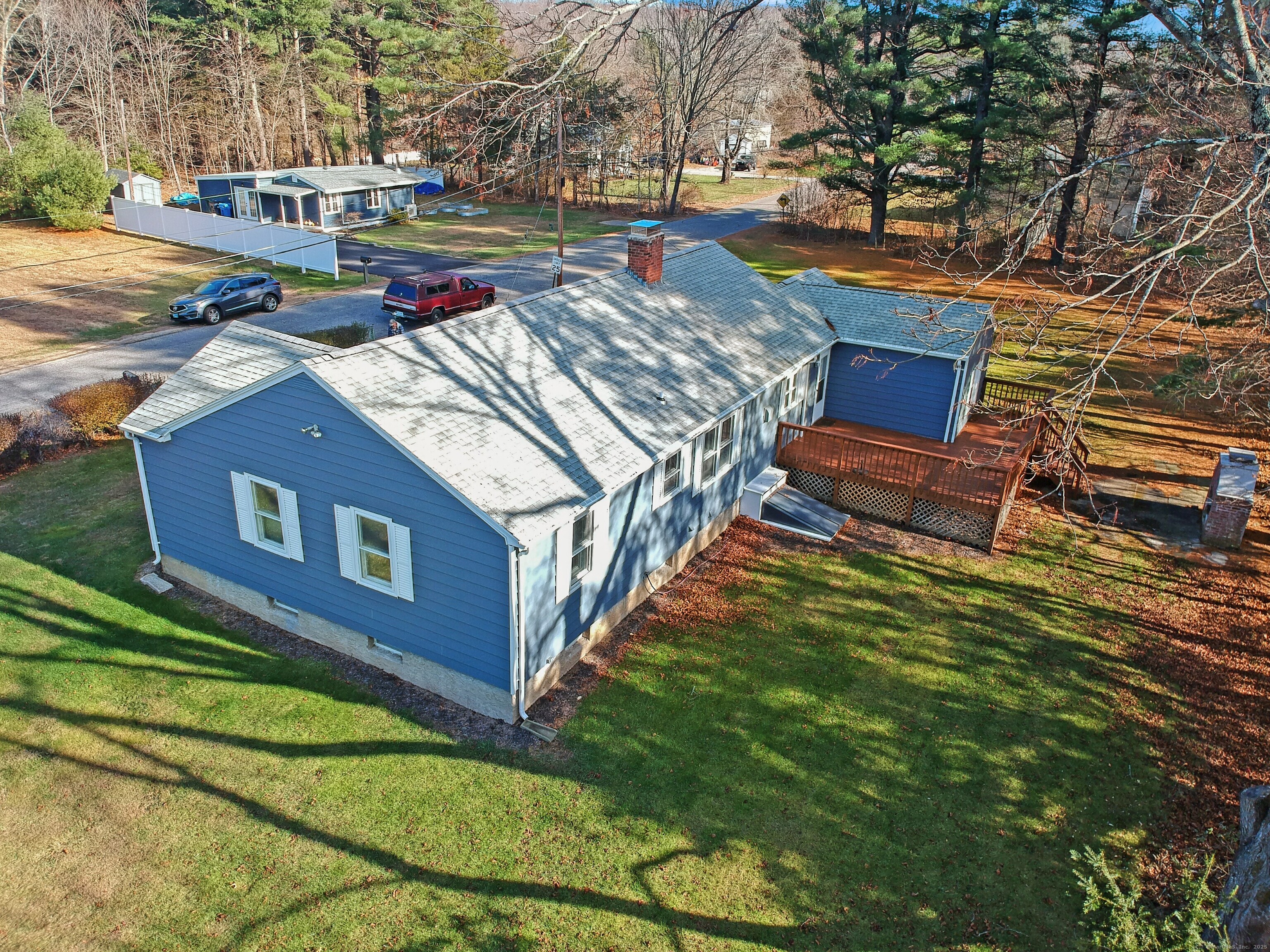 5 Chappell Street Chaplin, CT 06235 - Photo 5 of 40 a backyard of a house with outdoor seating
