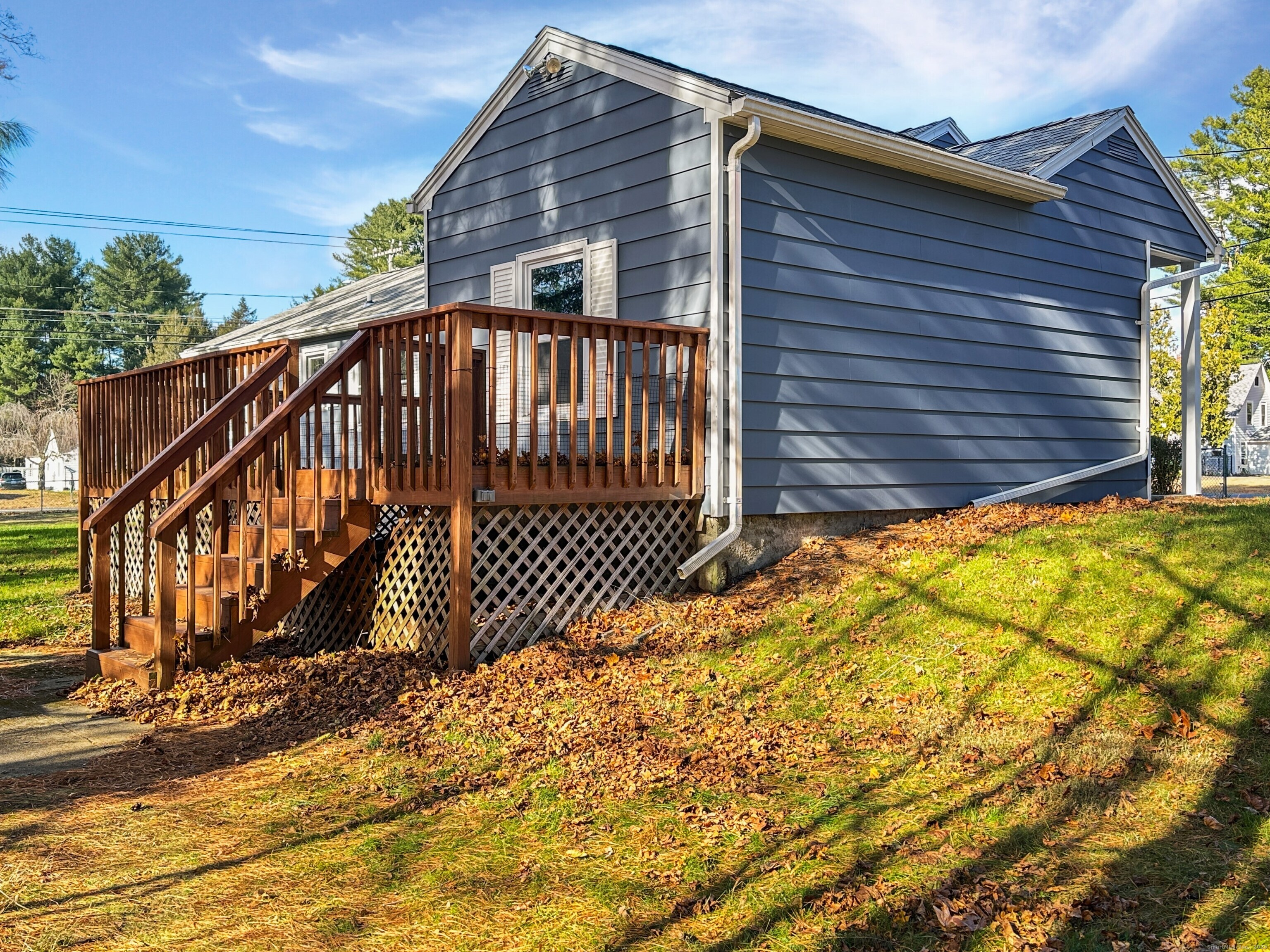 5 Chappell Street Chaplin, CT 06235 - Photo 8 of 40 a view of a house with wooden fence