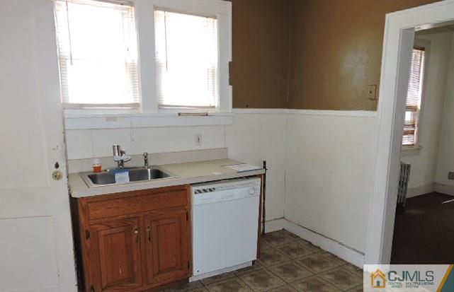 1801 Rutherford Street Rahway, NJ 07065 - Photo 3 of 10 a kitchen with a sink cabinets and window