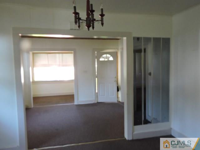 1801 Rutherford Street Rahway, NJ 07065 - Photo 5 of 10 a view of a hallway to rooms