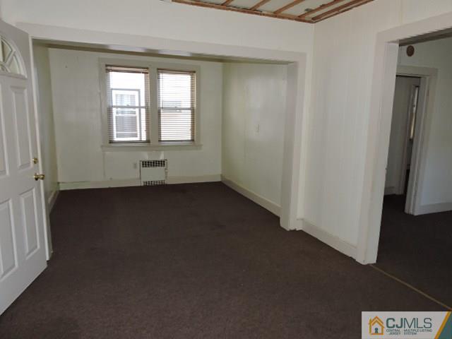1801 Rutherford Street Rahway, NJ 07065 - Photo 6 of 10 an empty room with windows