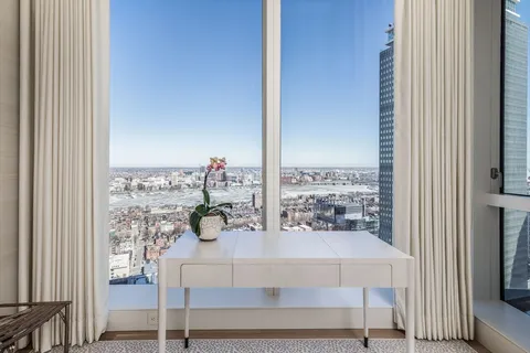 a view of a living room with furniture