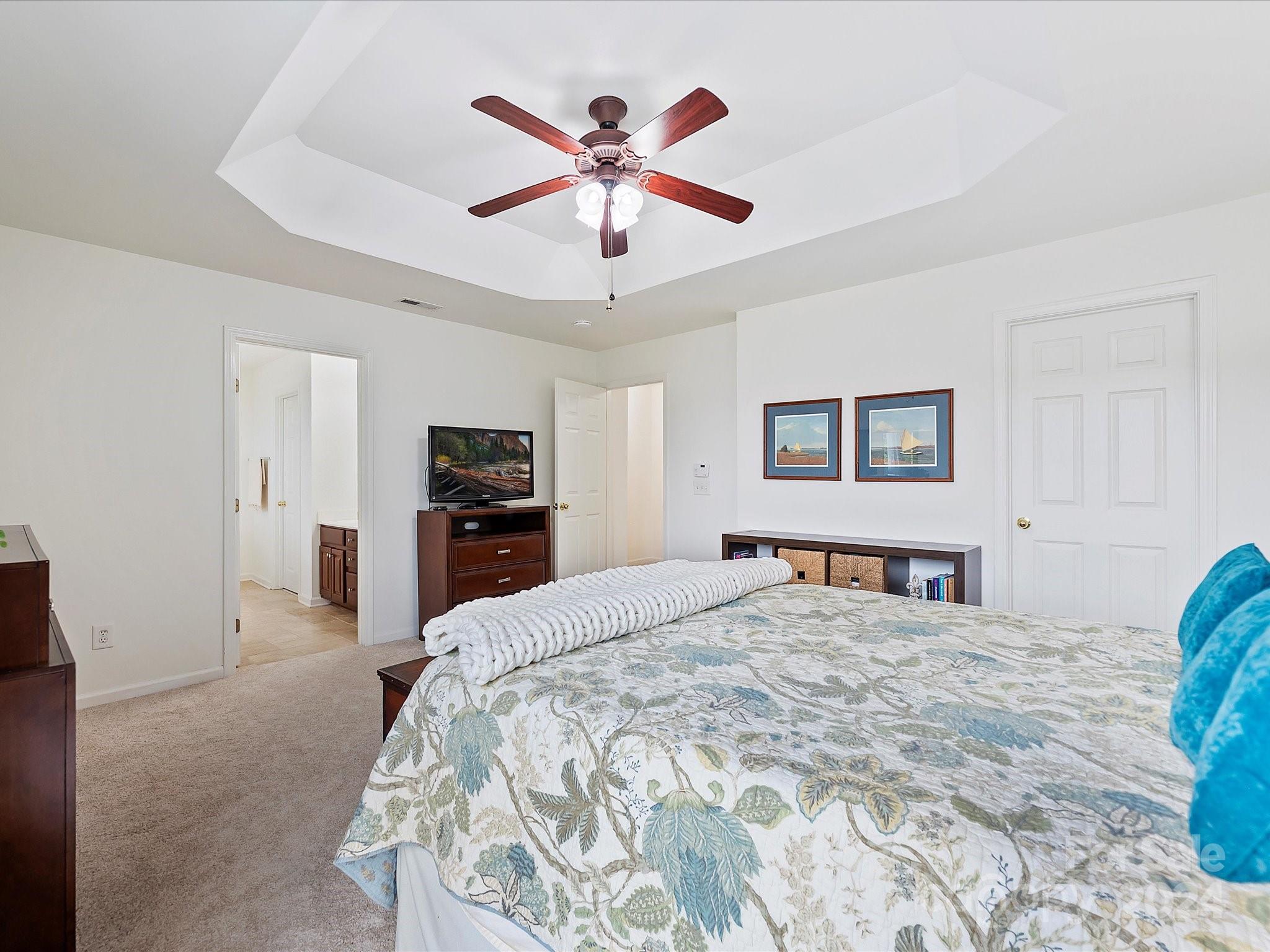 117 Snead Road Fort Mill, SC 29715 - Photo 25 of 36 a bedroom with a bed and a tv