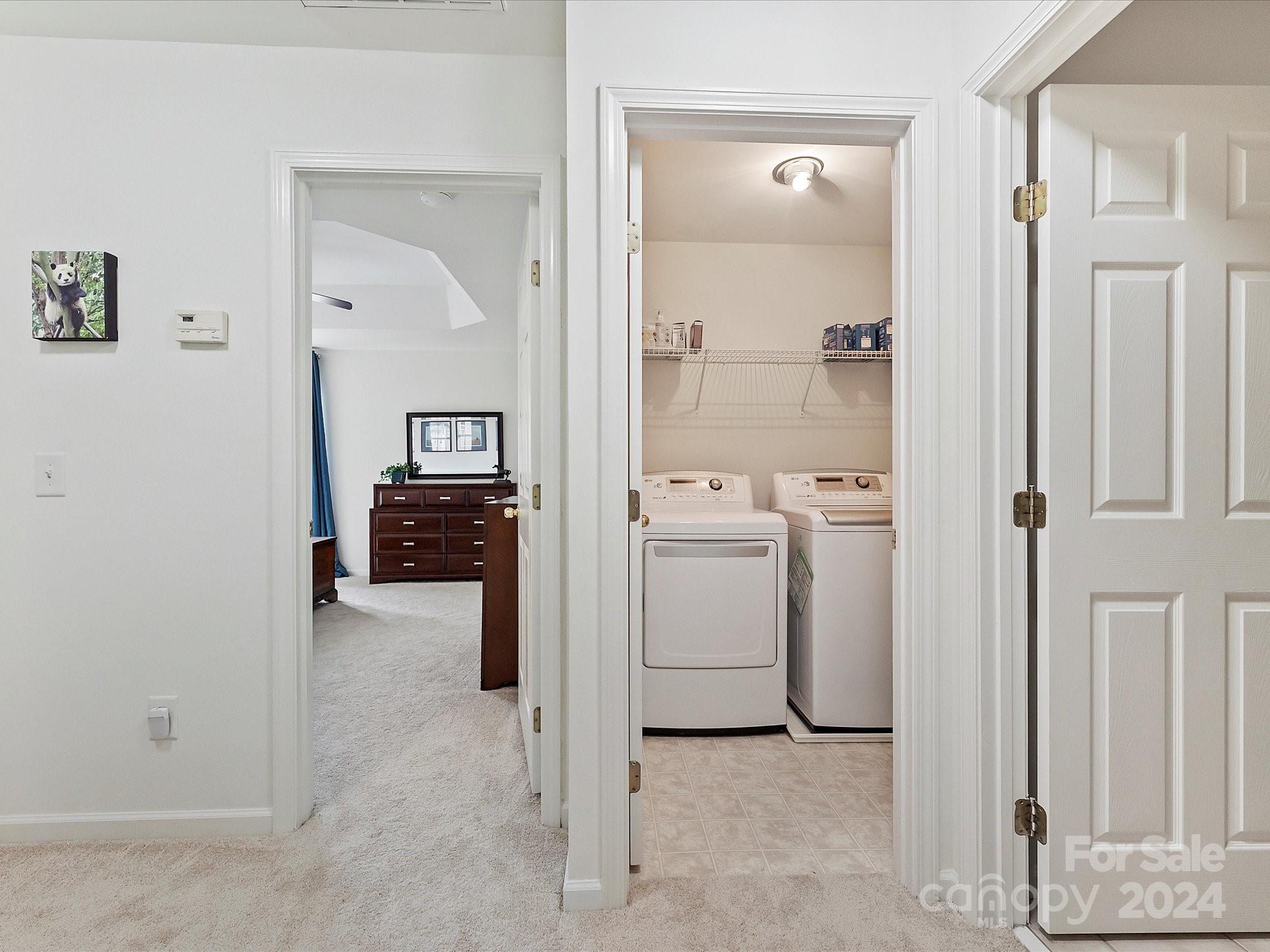 117 Snead Road Fort Mill, SC 29715 - Photo 31 of 36 a view of a storage & utility room with washer and dryer