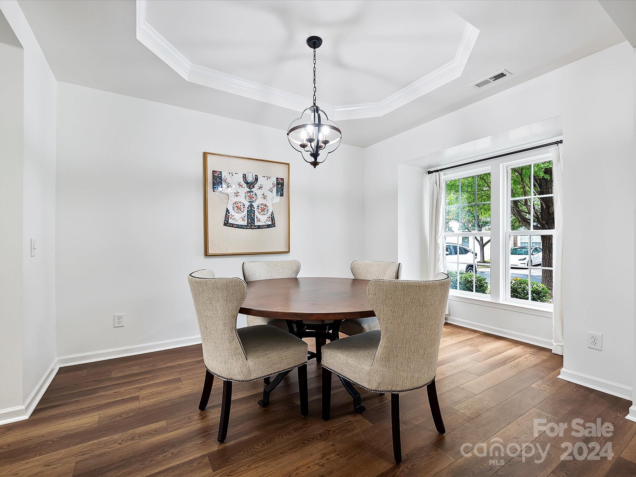 117 Snead Road Fort Mill, SC 29715 - Photo 5 of 36 a view of a dining room with furniture window and wooden floor