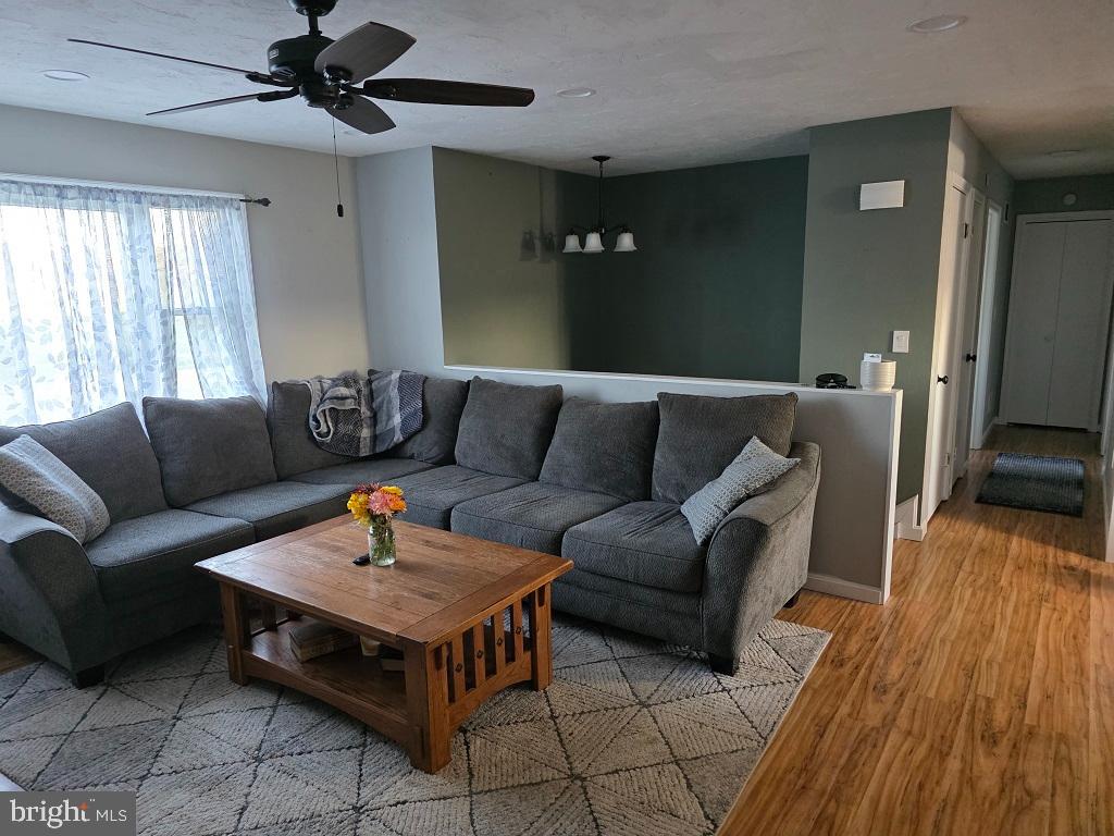 349 Basehoar School Road Littlestown, PA 17340 - Photo 6 of 31 a living room with furniture and a wooden floor