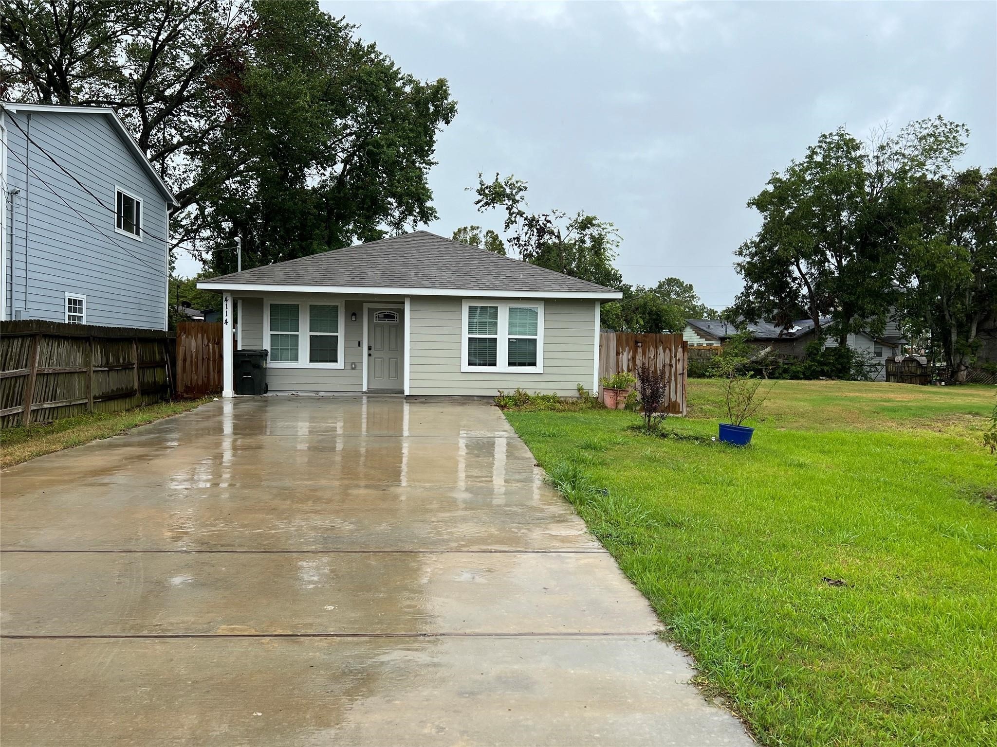 4114 Brown Street Bacliff, TX 77518 - Photo 1 of 12 a view of a house with a garden