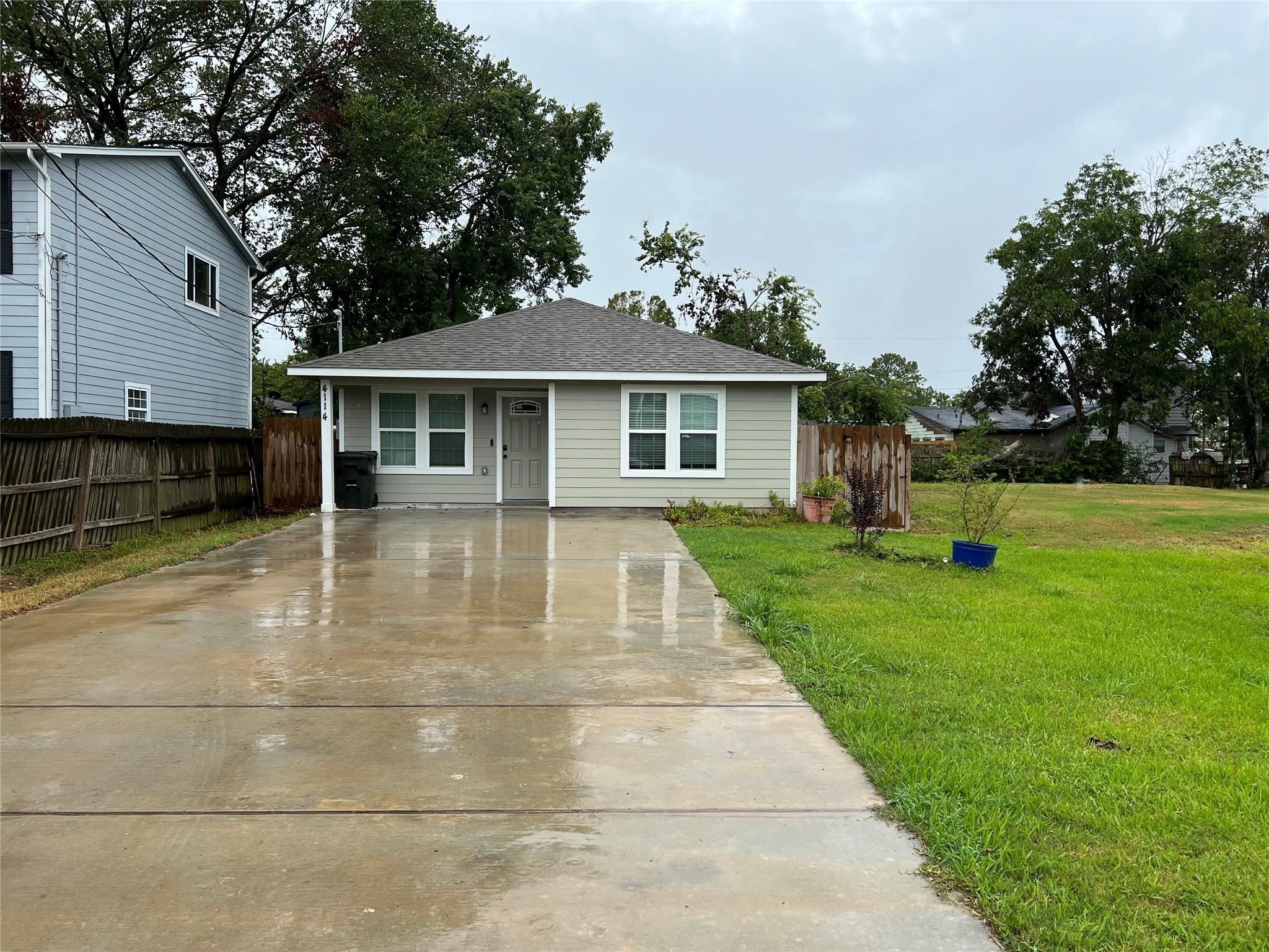 4114 Brown Street Bacliff, TX 77518 - Photo 2 of 12 a view of a house with a yard