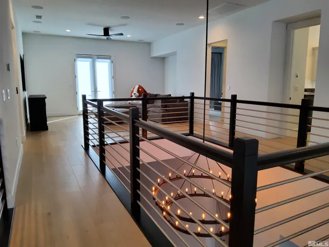 a view of a hallway with chairs