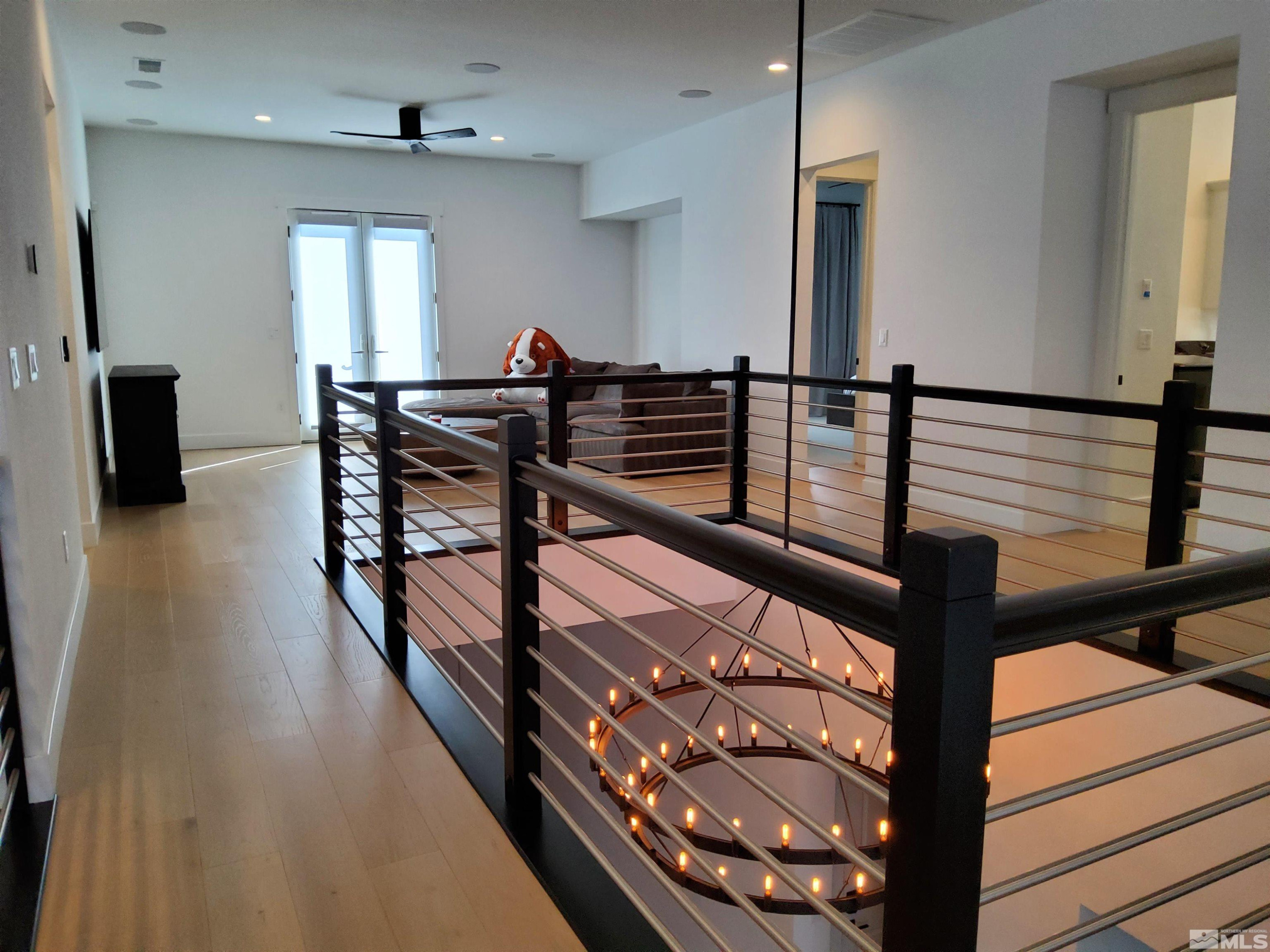 5449 Side Saddle Trail Reno, NV 89511 - Photo 16 of 35 a view of a hallway with chairs