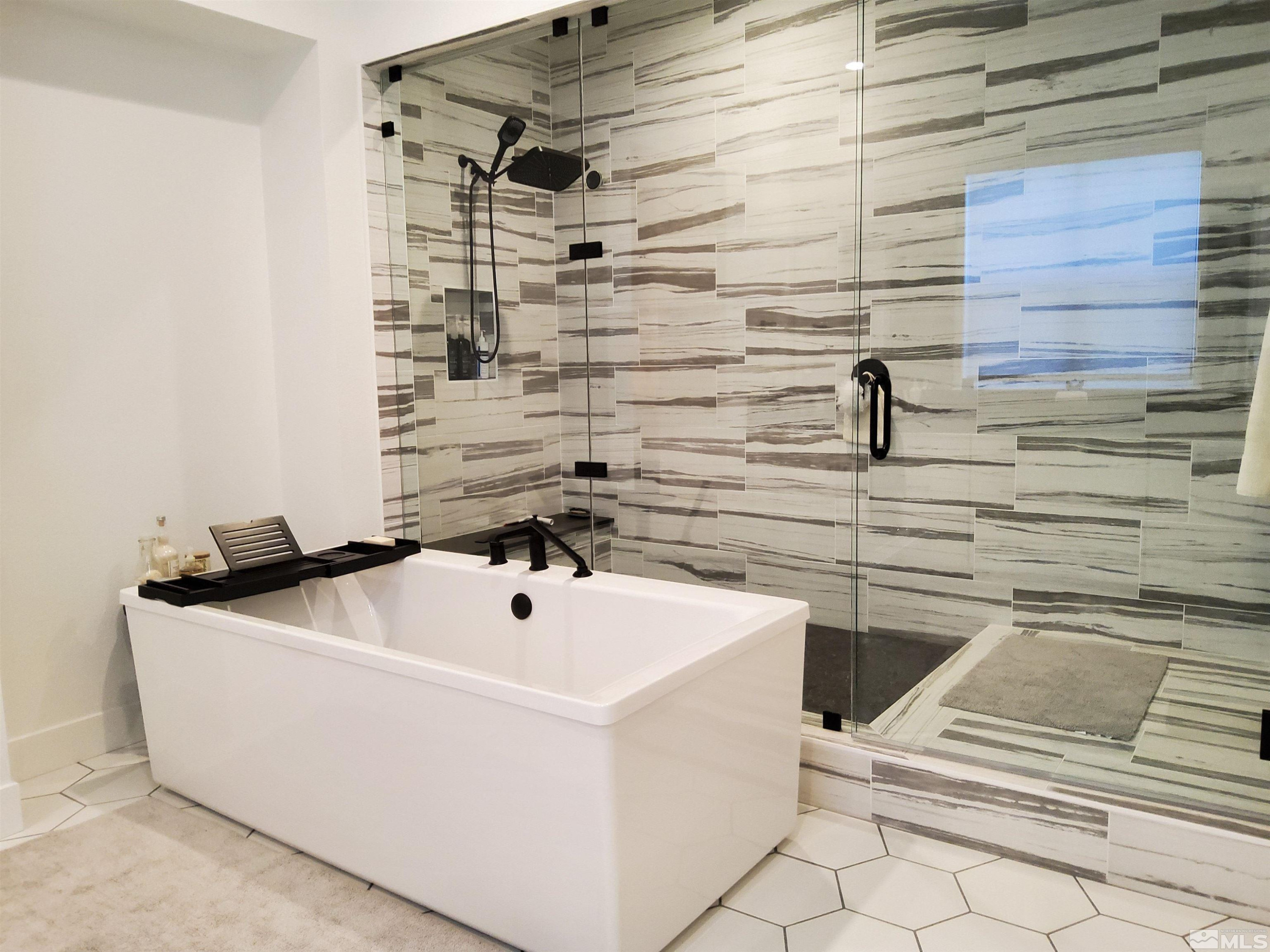 5449 Side Saddle Trail Reno, NV 89511 - Photo 28 of 35 a bathroom with a sink and a shower