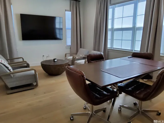 a view of a workspace with furniture