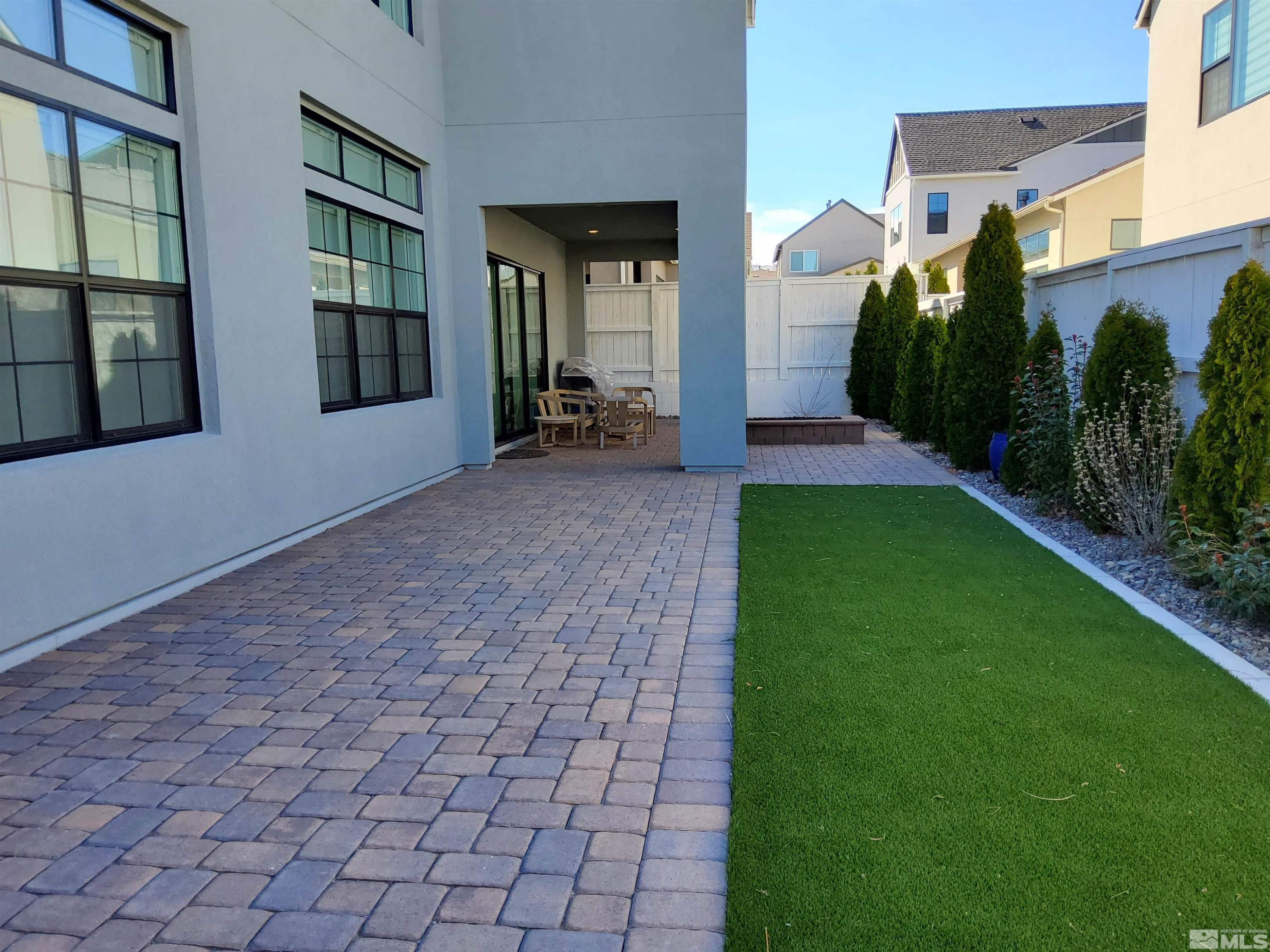 5449 Side Saddle Trail Reno, NV 89511 - Photo 32 of 35 a view of a house with a yard