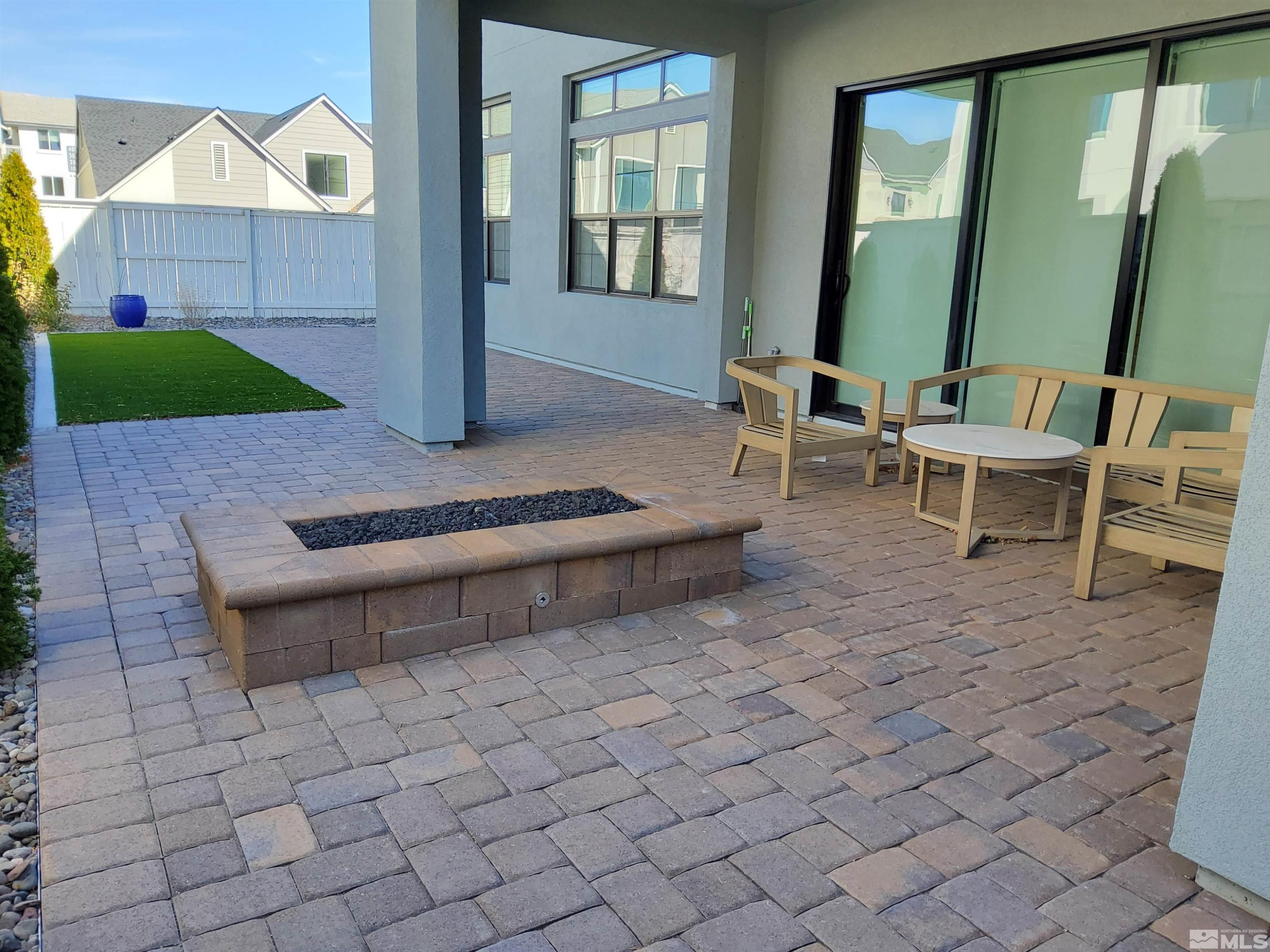 5449 Side Saddle Trail Reno, NV 89511 - Photo 33 of 35 a living room with furniture and a garden