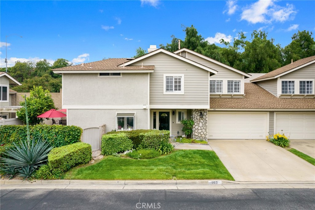 963 Bidwell Road San Dimas, CA 91773 - Photo 1 of 1 a view of a yard in front view of a house