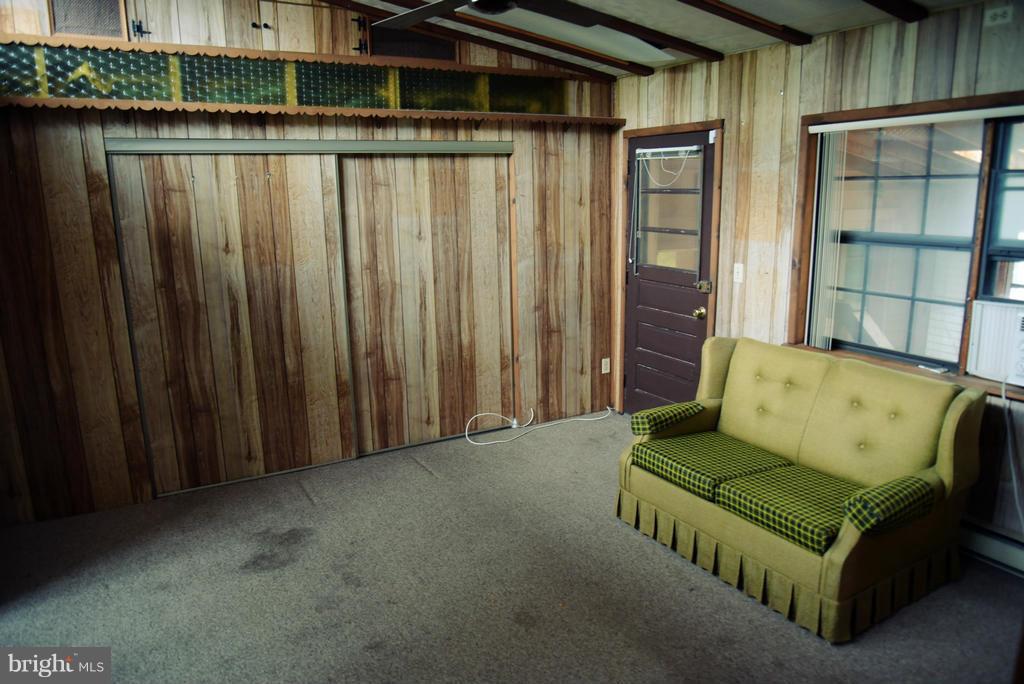 2310 Reckord Road Joppa, MD 21085 - Photo 22 of 30 a view of a couches in the patio