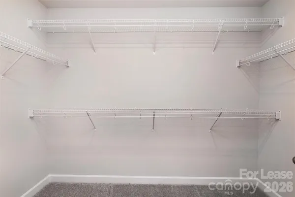 a view of a room with racks on the wall