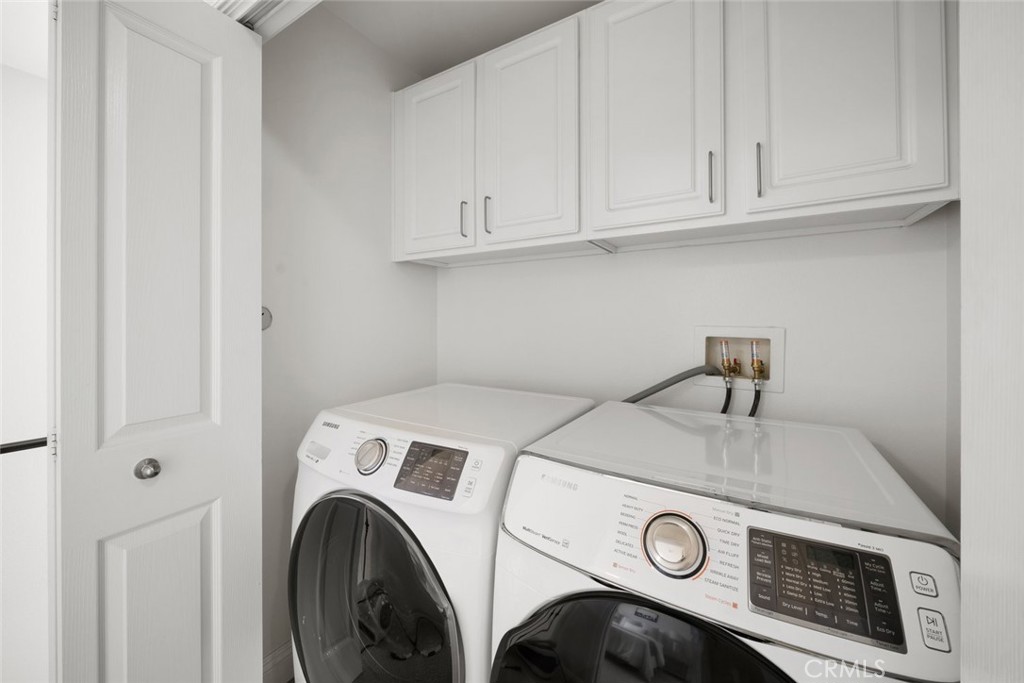 1012 La Costa Court Atascadero, CA 93422 - Photo 19 of 21 a utility room with dryer and washer