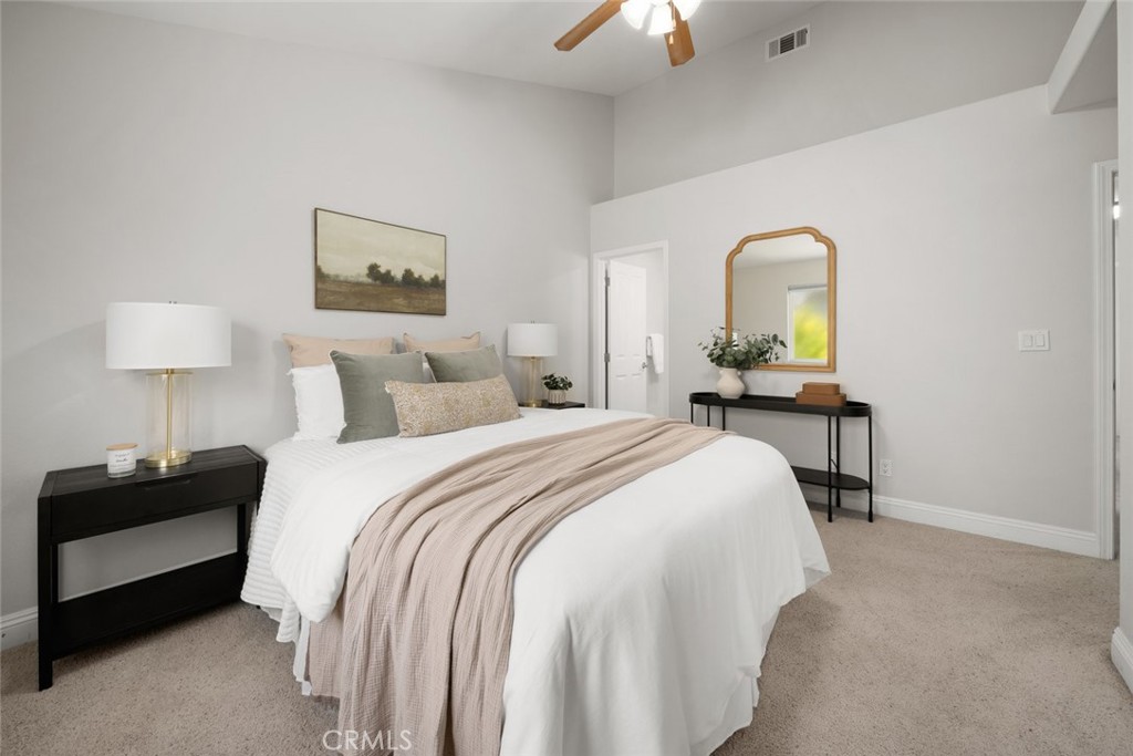 1012 La Costa Court Atascadero, CA 93422 - Photo 9 of 21 a bedroom with a bed and a painting on the wall