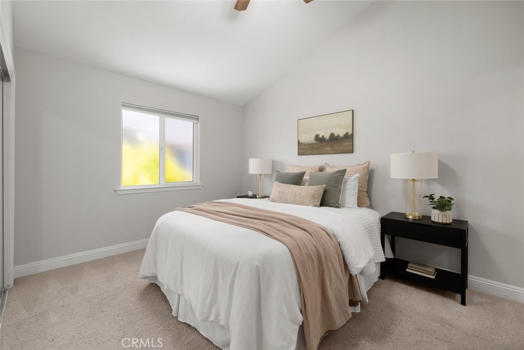 1012 La Costa Court Atascadero, CA 93422 - Photo 10 of 21 a bedroom with a bed and a window