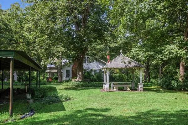 a view of backyard with green space