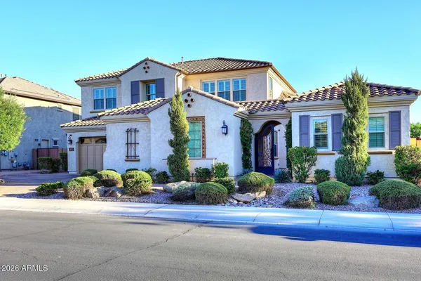 front view of a house with a yard