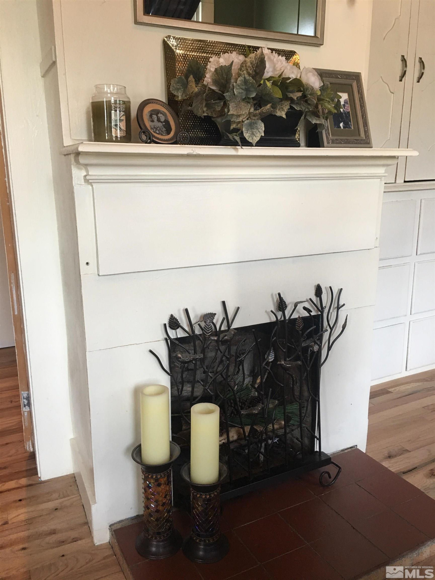 140 Water Street Austin, NV 89310 - Photo 15 of 43 a close view of a sink and a stove with wooden floor
